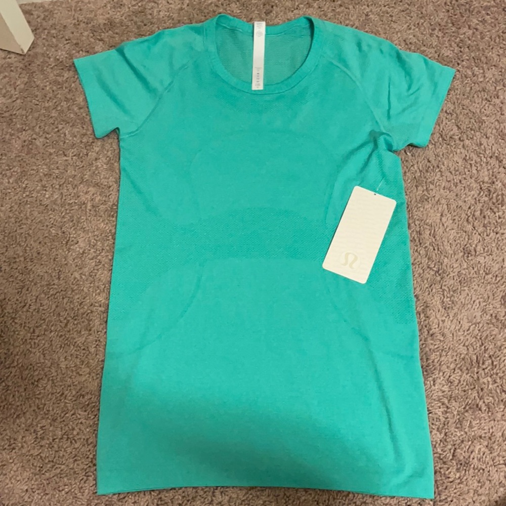 NWT teal lululemon top size 8